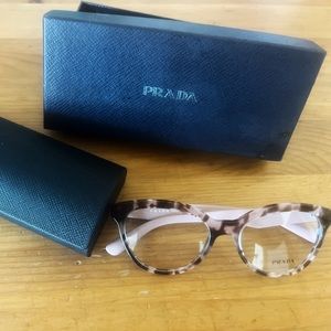 New, never worn, eyeglass frames.  Includes glasses, case and box.
